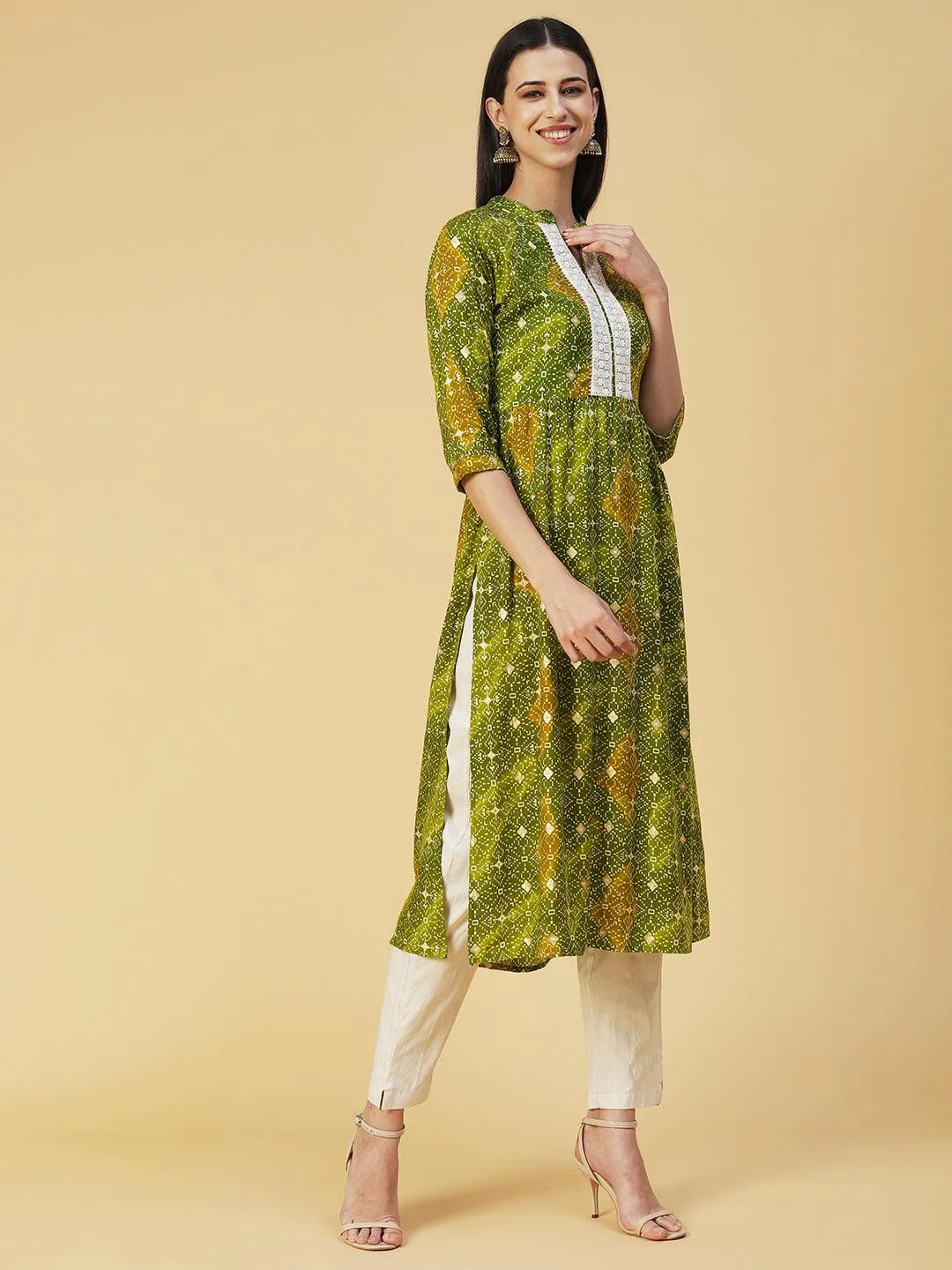 Abstract Printed Resham Embroidered Kurta With Striped Pants - Green