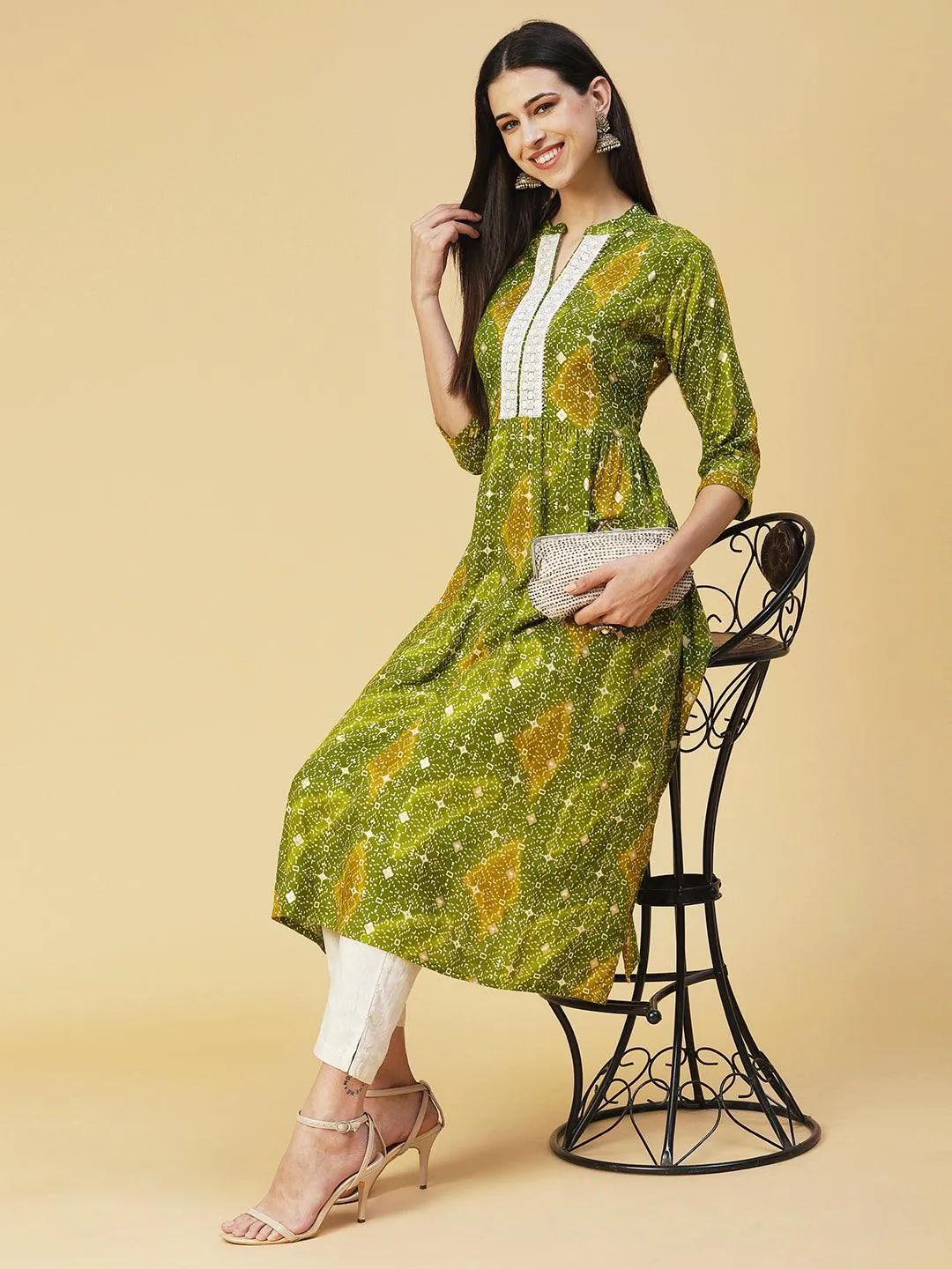 Abstract Printed Resham Embroidered Kurta With Striped Pants - Green