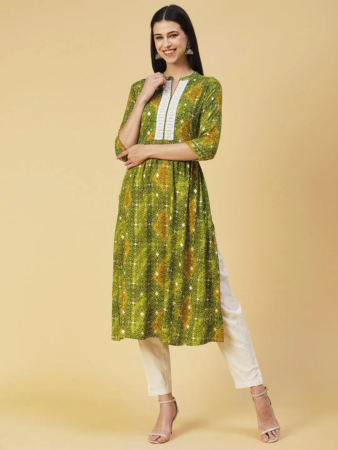 Abstract Printed Resham Embroidered Kurta With Striped Pants - Green